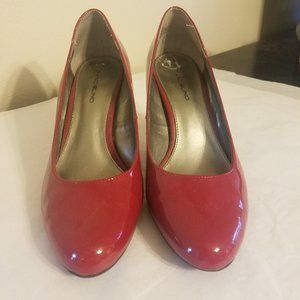 Bandolino red patent pumps 7.5 never worn w/o box